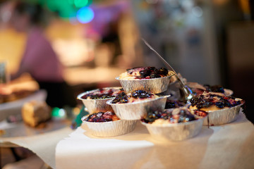Small vegan blueberry pies on a table in Camden