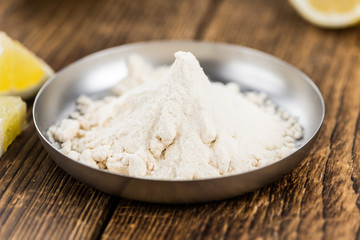 Lemon powder (fresh) as detailed close-up shot, selective focus)