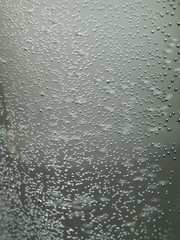 Bubbles in water, rain drops on glass, abstract background