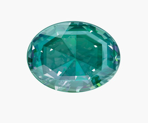 Insulated oval green gemstone on white background.