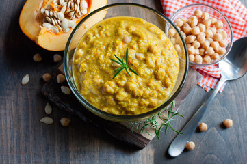Chickpea and pumpkin curry, healthy vegan meal, autumn or fall cooking, selective focus, toned image