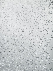 Bubbles in water, rain drops on glass, abstract background