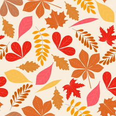Fototapeta premium Autumn leaves seamless pattern. Autumn colors, red, gold, orange. Autumn leaves on the light yellow background.