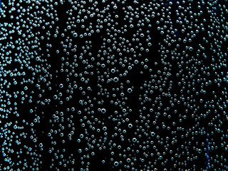 Bubbles in water, rain drops on glass, abstract background