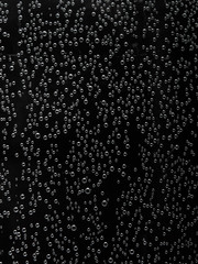 Bubbles in water, rain drops on glass, abstract background