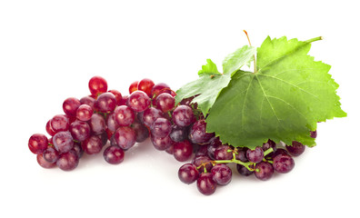 Red grape with leaf isolated on white background