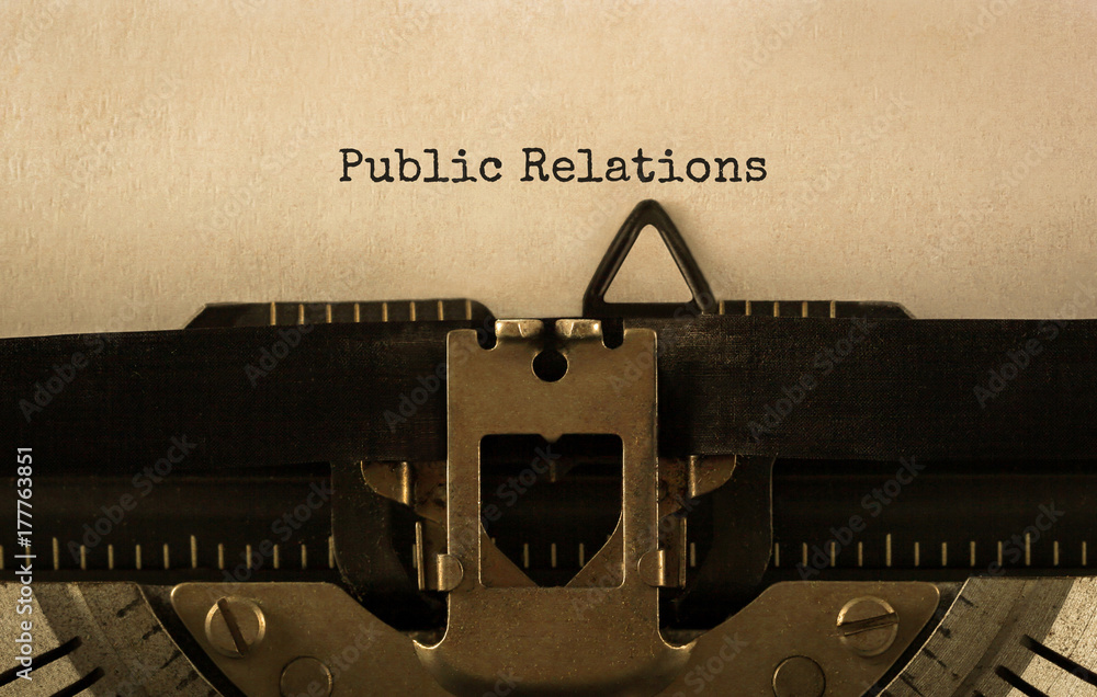 Poster text public relations typed on retro typewriter
