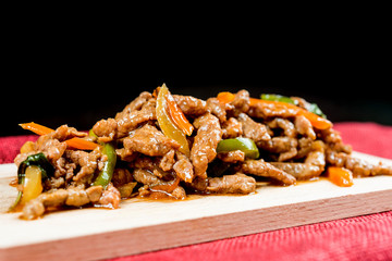 wok fried pork stir fry with sweet peppers and chinese vegetables