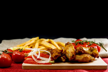 delicious fried chicken wings with sauce