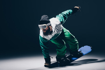 Plakat snowboarder practicing on snowboard