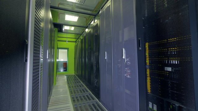 Working Data Center Full of Server Racks.