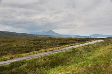 A narrow road in Scotland countryside
