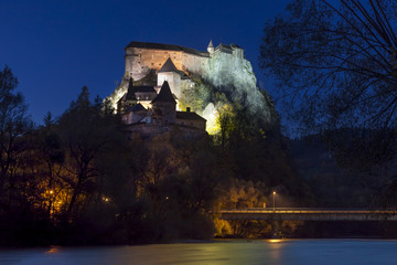 medieval citadela over the river at night, Oravsky castle, Slovakia