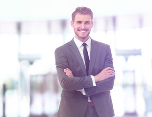 Handsome smiling confident businessman portrait