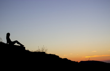silhouette of person against a beautiful sunset .travel photos