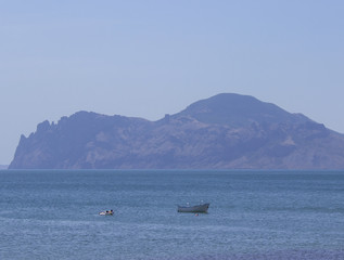Obraz premium A beautiful landscape that shows the sea and mountains. Crimea, Russia.