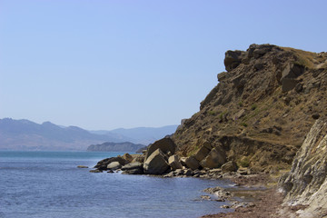 Fototapeta na wymiar A beautiful landscape where you can see the rocks and the blue sea