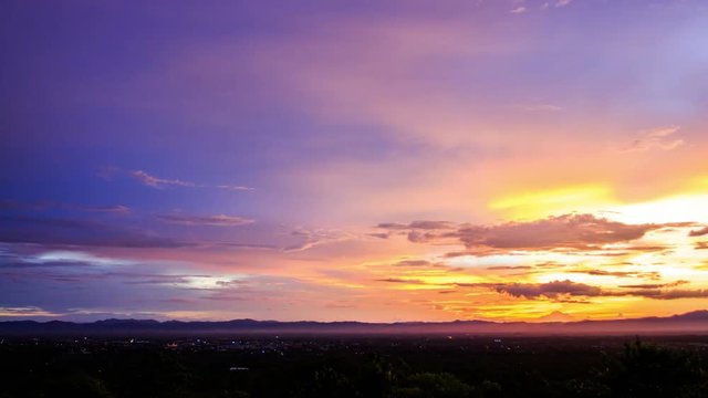 Timelapse colorful dramatic sky with cloud at sunset.