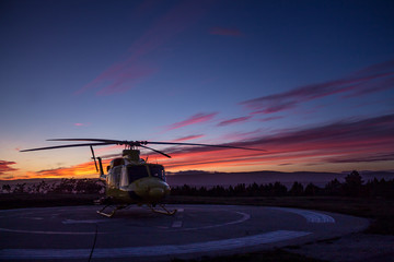 Helicopter in sunset