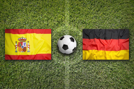 Spain Vs. Germany Flags On Soccer Field