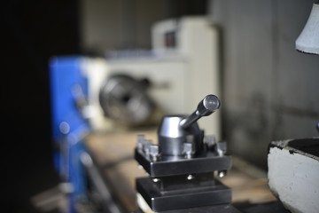 Fototapeta na wymiar Technicians are turning lathe with horizontal lathe machine.