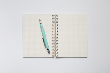 School notebook with stylish green pen