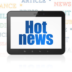 News concept: Tablet Computer with Hot News on display