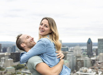 Happy couple enjoy Montreal landscape