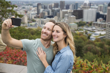 Happy couple enjoy Montreal landscape