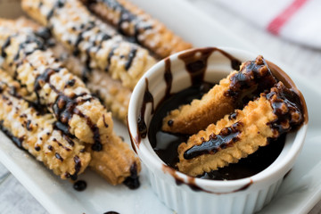 Spanish Dessert Churros with Chocolate Sauce / Baked Sweet Dough.
