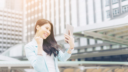 lifestyle business woman feel happy using smartphone