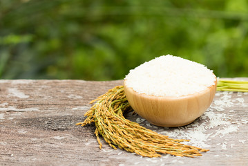 Close up Thai jasmine rice in bowl on wooden table