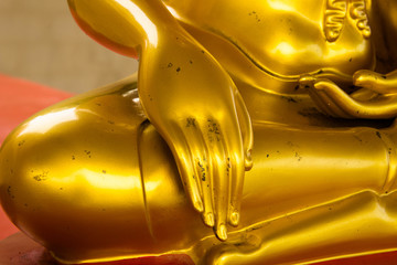 hand golden buddha