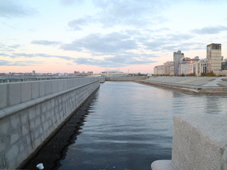 embankments, canals, urban blocks in the evening on the coast