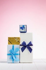 Gift box wrapped in recycled paper with ribbon bow