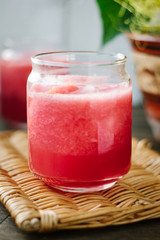 Watermelon smoothie in glasses with slices of watermelon
