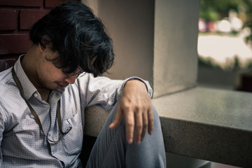 business man is stressed from his work. depression and anxiety concept.