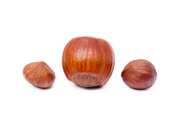 Group healty hazelnuts isolated on white background