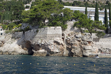 wild coast of croatian town dubrovnik from a boat