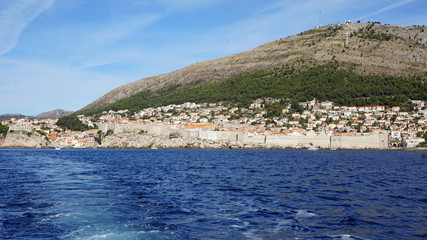Fototapeta premium wild coast of croatian town dubrovnik from a boat