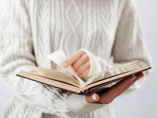 Woman holding book