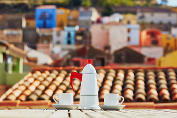 Coffee with view to Bosa village, Sardinia, Italy