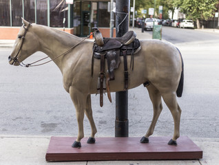 Statue of western horse with saddle