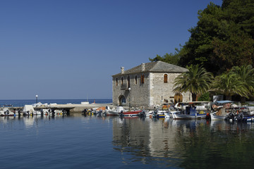 Fototapeta na wymiar Harbor with boats in Scala Potamai Greece.