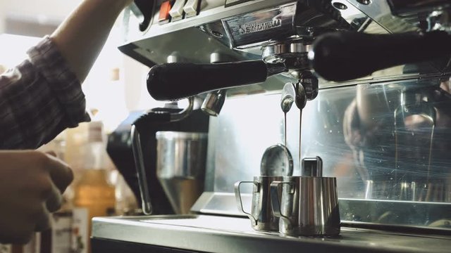 Barista making fresh espresso
