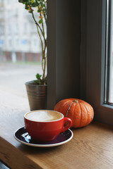 A cup of cappuccino on the table