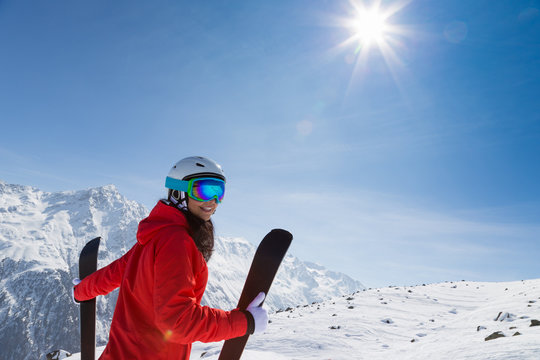 Beautiful brunette woman with ski