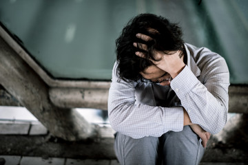 business man is stressed from his work. depression and anxiety concept.