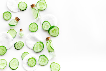 Sliced cucumber for face mask on white background top view copyspace