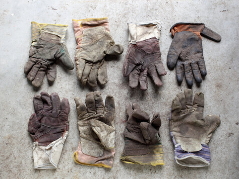 Dirty and worn workman's gloves